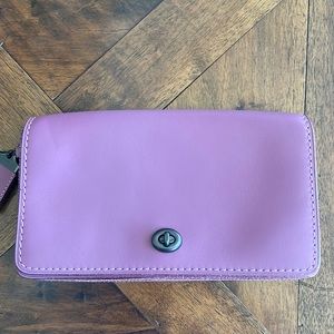 Purple leather COACH bag.